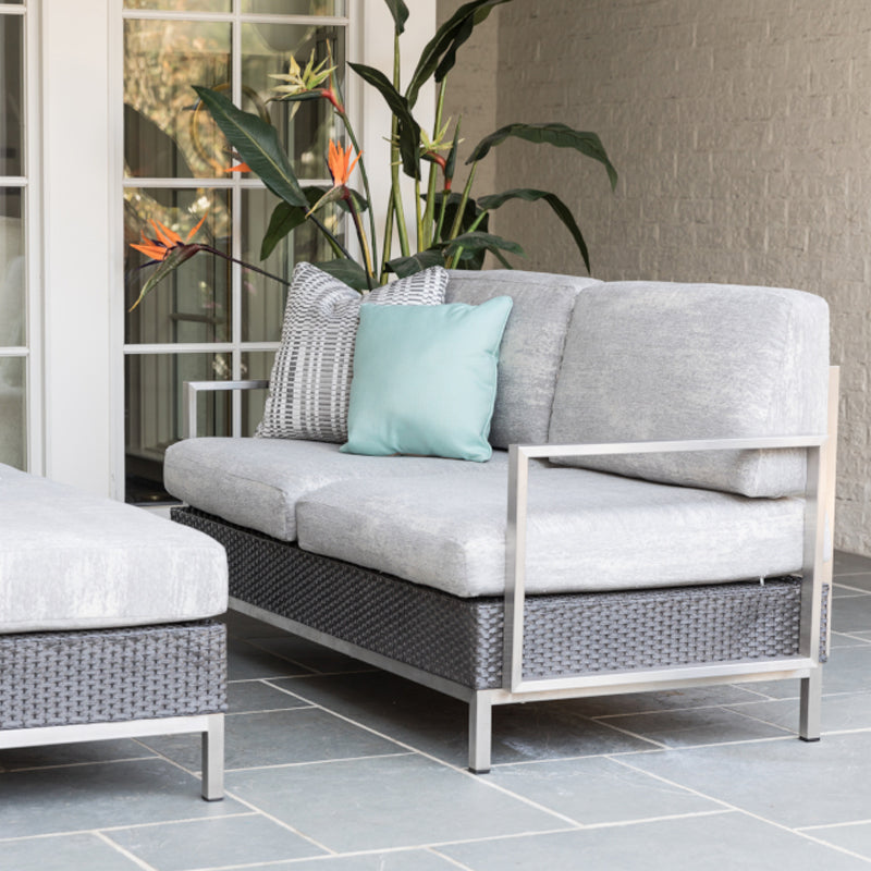 Gray Lloyd Flanders Elements Settee with Stainless Steel Arms and Back elements-settee-with-stainless-steel-arms-and-back A,B,C Lloyd Flanders Lloyd-Flanders-Elements-Settee-with-Stainless-Steel-Arms-and-Back-Lifestyle.jpg